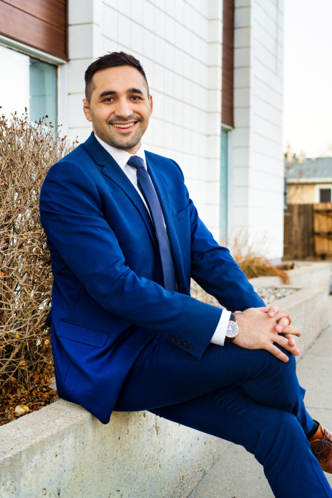 Coden Nikbakht Traffic Advocate sitting outside